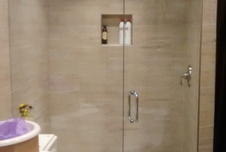 Custom 10mm Clear Tempered Glass shower c/w CR Laurence Deluxe Header, Prima Hinges